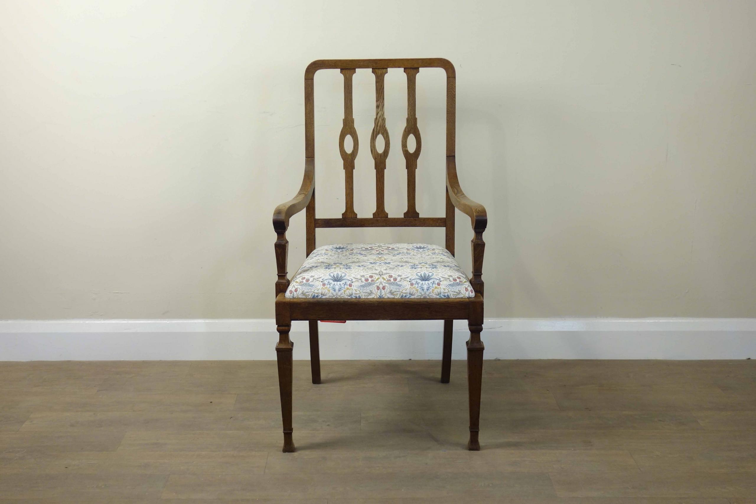 Vintage Ornate Solid Wood Carver Chair Height: 106cm, Width: 58cm, Depth: 48cm This item was cleaned, restored and upholstered in our London based workshop, using clear wax and William Morris 'Strawberry Thief' fabric.