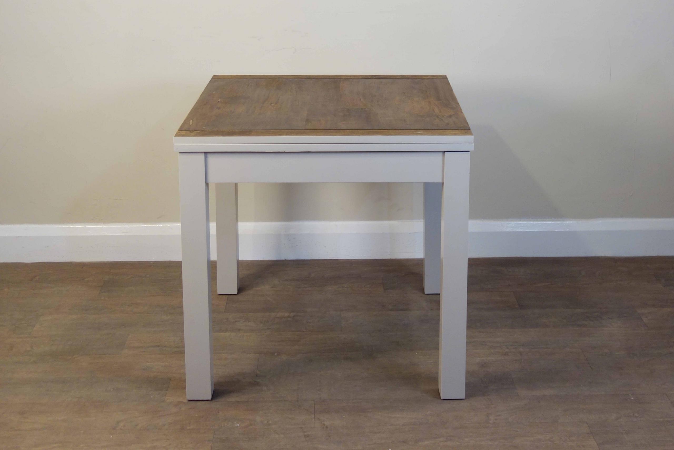 This Extendable Dining Table was sanded, restored and painted in our London based workshop, using Little Greene 'Mushroom' paint, walnut stain and wood oil.
