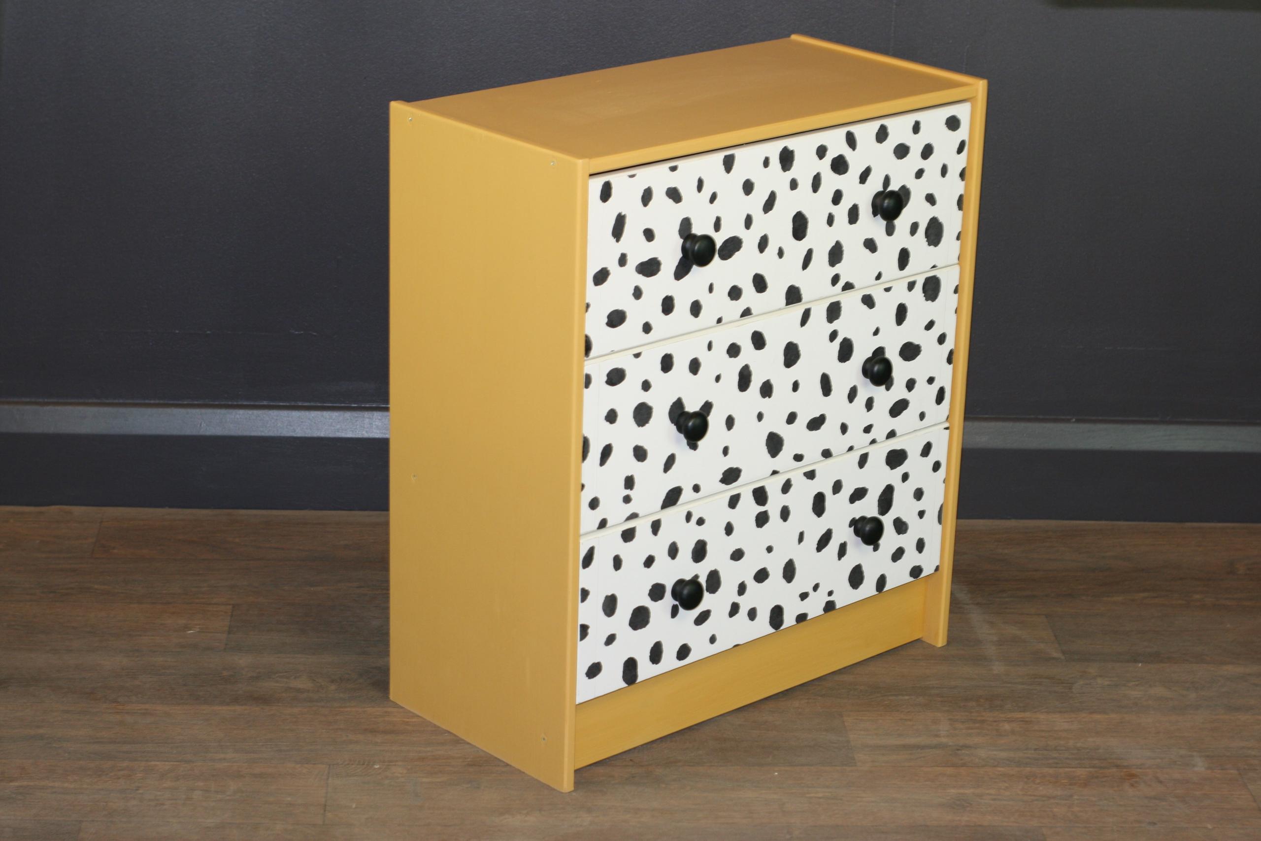 Small Chest of Drawers Height: 70cm, Width: 62cm, Depth 30cm This small chest of drawers was sanded and refinished in our London based workshop- hand painted using Farrow and Ball 'India Yellow' and has had Dalmation print wallpaper added to the front of the drawers.