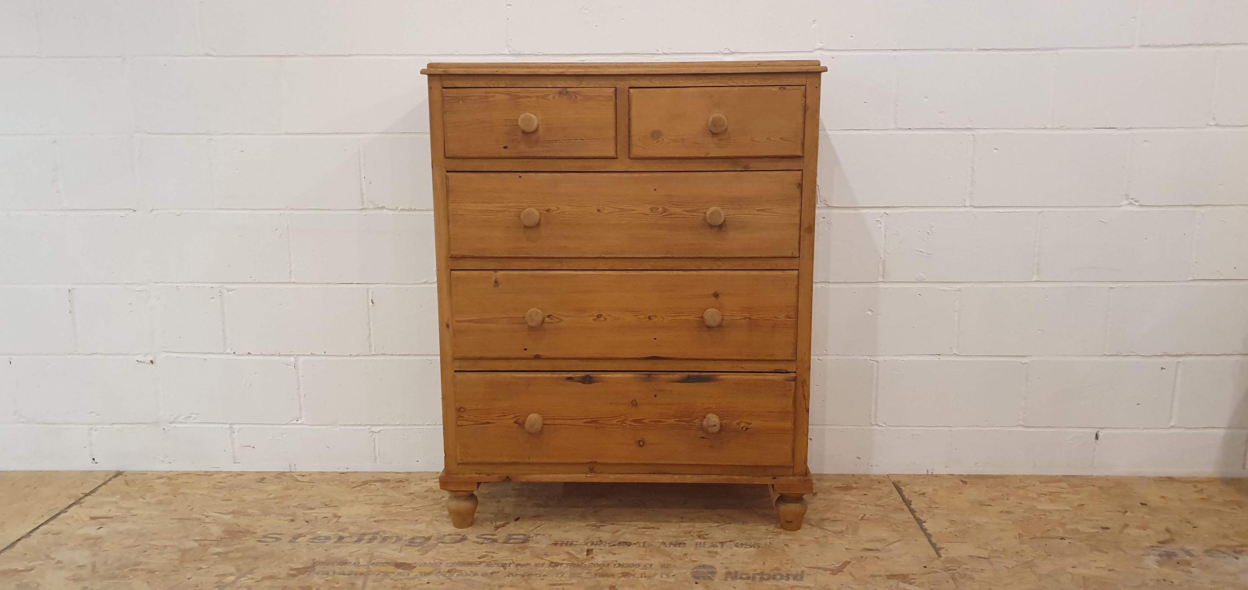 Large farmhouse style chest of drawers. Made from solid wood with a beautifully aged finish, this piece offers both charm and practical storage.