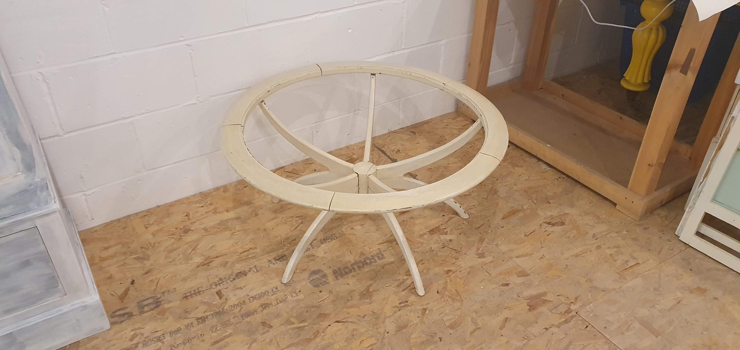 Mid century teak spider coffee table before it was fully restored and reassembled by hand.