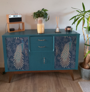 Upcycled Peacock Sideboard refinished by our volunteer.